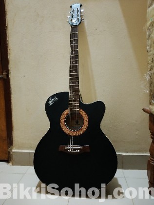 Signature Topaz 265 Semi-Acoustic black guitar.
